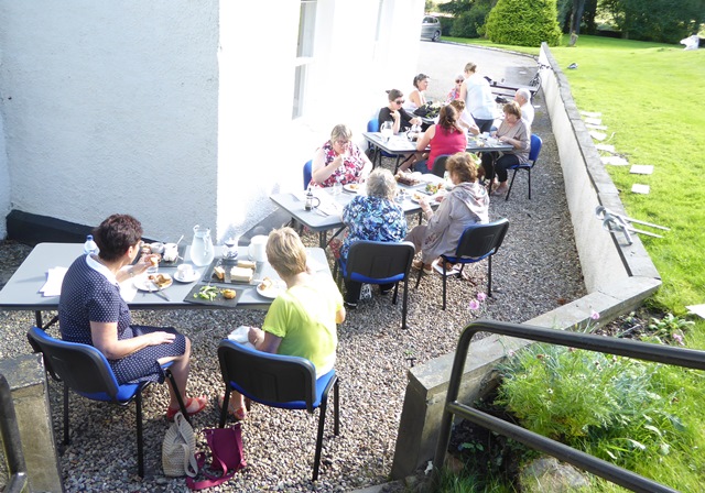 Ladies sitting outside painting watercolours at the Saplinbrae Hotel
